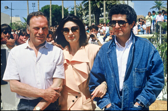 Archives - Jean-Louis Trintignant, Anouk Aimée et Claude Lelouch en 1986 au Festival de Cannes.