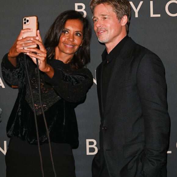 Brad Pitt et Karine Le Marchand à la première du film "Babylon" au cinéma Le Grand Rex à Paris, France, le 14 janvier 2023. © Coadic Guirec/Bestimage