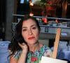 Olivia Ruiz et son livre Ecoute la pluie tomber lors de la soirée de l'été littéraire et musical aux Deux Magots à Paris © Philippe Baldini / Bestimage