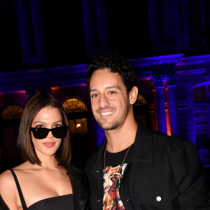 Iris Mittenaere et son compagnon Diego El Glaoui lors du défilé Etam Live Show 2022 dans les jardins des Archives Nationales lors de la fashion week printemps/été 2023 le 27 septembre 2022. © Agence Bestimage 