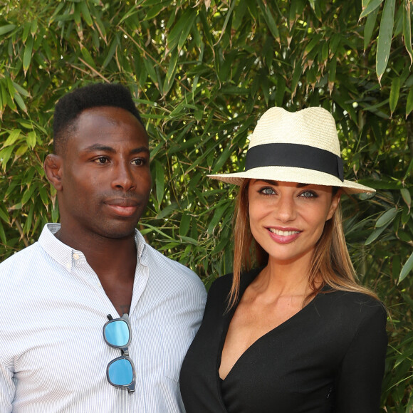 Ariane Brodier et son compagnon Fulgence Ouedraogo au village lors des internationaux de tennis de Roland Garros à Paris le 5 juin 2017. © Cyril Moreau / Dominique Jacovides / Bestimage
