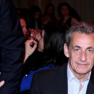Exclusif - Nicolas Sarkozy et sa femme Carla Bruni-Sarkozy - Dîner des "Femmes Culottées" Etam au Musée de la Monnaie à Paris le 22 mars 2022. Avec "Femmes culottées", Etam a décidé de mettre à l'honneur 52 femmes dans une série de photos de S. Sieff. Soutenant le réseau associatif Solidarité Femmes, le projet mêlera des noms connus et des personnalités de l'ombre à l'histoire inspirante. Cette initiative sur le long court est menée main dans la main avec Solidarité Femmes, réseau de 73 associations qui luttent contre les violences faites aux femmes et le 3919, le numéro d'aide aux femmes victimes de violences. Toutes les participantes arborent d'ailleurs un t-shirt blanc sur lequel on peut lire Femme Culottée. La pièce est disponible à l'achat en ligne ou en magasin pour 19,99 euros. L'intégralité des bénéfices de ce dernier ira au réseau associatif, un moyen pour la marque de marquer son engagement. © Rachid Bellak/Bestimage 