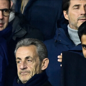 Luis Campos ( directeur sportif PSG ), Nicolas Sarkozy, Nasser al-Khelaïfi ( Président du Paris Saint Germain) - Match de 8ème de finale aller de la Ligue Des Champions 2023 (LDC) "PSG - Bayern Munich (0-1)" au Parc Des Princes, le 14 février 2023.