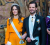 En 2015, elle a officiellement accueilli la princesse Sofia au sein de ses rangs après son mariage avec le prince Carl Philip. Son profil était pourtant loin de correspondre aux attentes de la Couronne à l'époque.
Le prince Carl Philip de Suède et la princesse sofia (Hellqvist) - La famille royale de suède au dîner lors de la cérémonie de remise des Prix Nobel à Stockholm le 11 décembre 2022. 