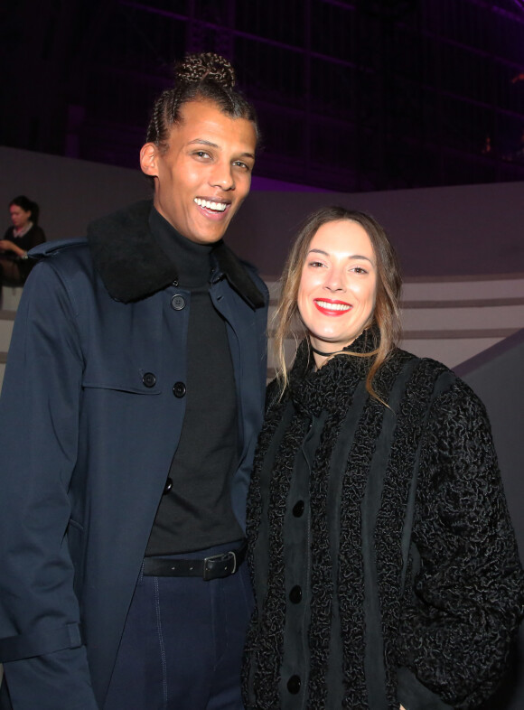 Info - Sortie le 4 mars de "Multitude" nouvel album de Stromae - Stromae (nouvelle coupe de cheveux) et sa femme Coralie Barbier au défilé "Victoria's Secret Paris 2016" au Grand Palais à Paris, le 30 novembre 2016. © Denis Guignebourg/Bestimage