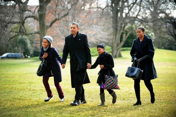 Barack et Michelle Obama, accompagnés de leurs enfants Sasha et Malia