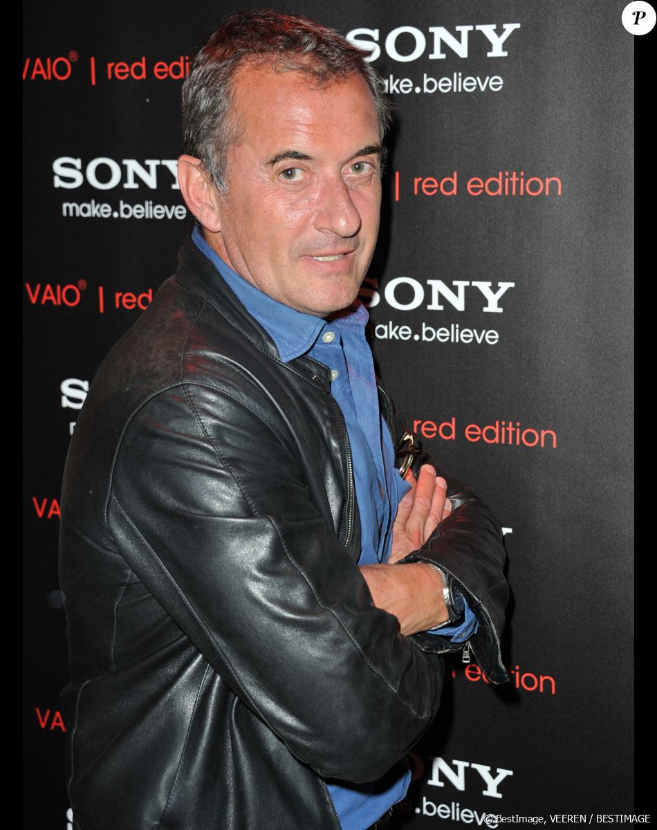 Christophe Dechavanne - Soiree Sony Style a la boutique Sony (39 avenue George V) a Paris le 2 juillet 2013. Sony lance une serie limitee de prestige VAIO®