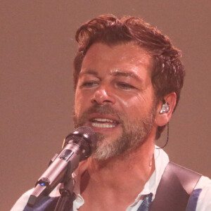 Exclusif - Christophe Maé en concert au Zénith de Lille le 13 novembre 2021. le chanteur de « On s’attache » a enflammé le Zénith de Lille avec un concert « world music » de haut niveau musicalement, dansant et plein de belles surprises. Fendant la foule de la scène aux tribunes, de la fosse au balcon. © Stephane Vansteenkiste / Bestimage  