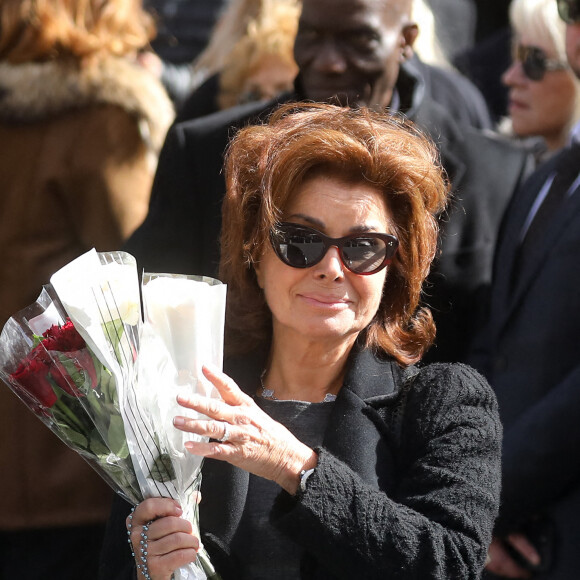Dominique Tapie le regrette aujourd'hui. 
Dominique Tapie (femme du défunt) - Sorties de la messe funéraire en hommage à Bernard Tapie en l'église Saint-Germain-des-Prés à Paris. Le 6 octobre 2021 © Jacovides-Moreau / Bestimage 