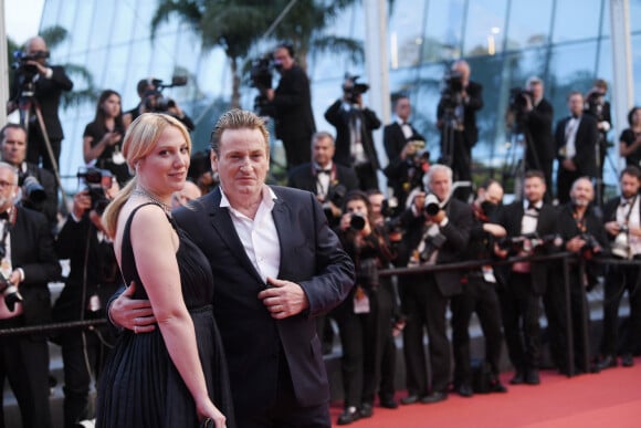 Benoît Magimel et Margot Pelletier se sont rencontrés en 2016. 
Benoît Magimel et sa femme Margot Pelletier à la montée des marches du film "Mascarade" lors du 75ème Festival International du Film de Cannes. © Rachid Bellak/Bestimage 