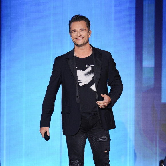 Le chanteur y fait "pas mal d'aller-retours", notamment parce qu'il a "un gros projet" qui se prépare là-bas. 
Exclusif - David Hallyday - Enregistrement de l'émission TV "La Chanson Secrète 2", qui sera diffusée sur TF1. © Gaffiot-Perusseau / Bestimage 