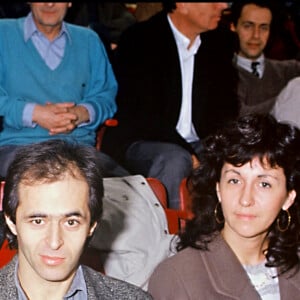 Mais aussi de plus en plus la fille aînée.
Jean-Jacques Goldman et Catherine Morlet à l'open de Bercy en 1990.