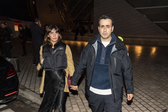 Exclusif - Jonathan Cohen et sa compagne Giulietta Canzani Mora Dj Piu Piu (enceinte) - Les célébrités au concert de Jay Z à la fondation Louis Vuitton à Paris, France, le 14 avril 2023. © Da Silva-Perusseau/Bestimage 