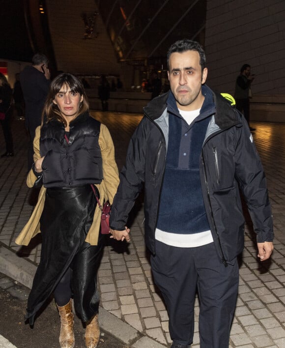 Exclusif - Jonathan Cohen et sa compagne Giulietta Canzani Mora Dj Piu Piu (enceinte) - Les célébrités au concert de Jay Z à la fondation Louis Vuitton à Paris, France, le 14 avril 2023. © Da Silva-Perusseau/Bestimage 