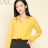 Adoptez l'alluee de Jenifer avec cette chemise jaune Bujnie