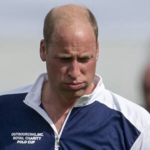 Le prince William, duc de Cambridge, et Catherine (Kate) Middleton, duchesse de Cambridge, arrivent au match de polo caritatif Out-Sourcing Inc au Guards Polo Club, Smiths Lawn à Windsor le 6 juillet 2022. 