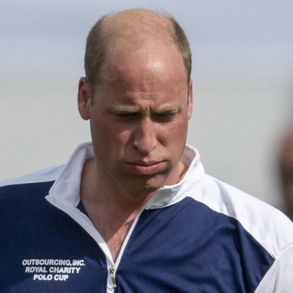 Le prince William, duc de Cambridge, et Catherine (Kate) Middleton, duchesse de Cambridge, arrivent au match de polo caritatif Out-Sourcing Inc au Guards Polo Club, Smiths Lawn à Windsor le 6 juillet 2022. 