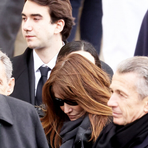 Guillaume Sarkozy, Carla Bruni-Sarkozy, François Sarkozy, Olivier Sarkozy - Sorties des obsèques de Päl Sarkozy de Nagy Bocsa, le père de Nicolas Sarkozy, en l'église Saint-Jean Baptiste à Neuilly sur Seine le 9 mars 2023. © Dominique Jacovides / Bestimage