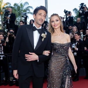 Adrien Brody a fait sensation
Adrien Brody et sa compagne Georgina Chapman - Montée des marches du film " Asteroid City " lors du 76ème Festival International du Film de Cannes, au Palais des Festivals à Cannes. © Olivier Borde / Bestimage