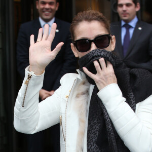 Celine Dion et Rene Angelil quittent l'hotel Royal Monceau, ou ils sejournent a Paris pour se rendre a Anvers pour le second concert de sa tournee europeenne. Le 22 novembre 2013 