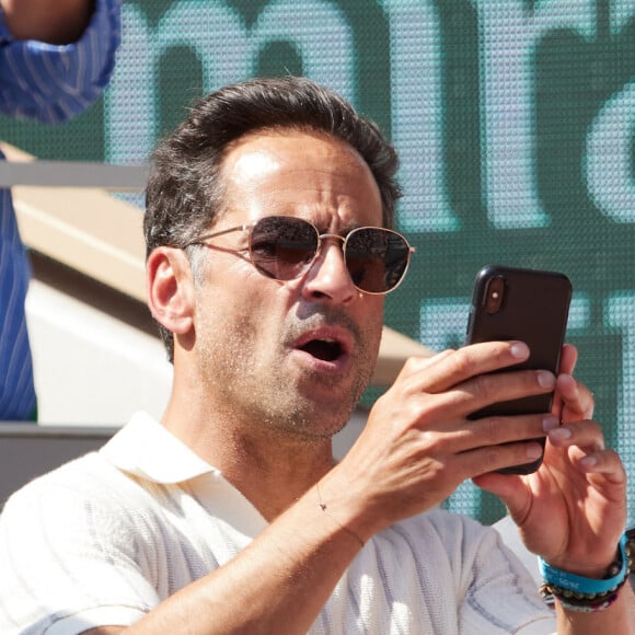 Florent Peyre et sa compagne Virginie Stref dans les tribunes lors des Internationaux de France de Tennis de Roland Garros 2023. Paris, le 29 mai 2023. © Jacovides / Moreau / Bestimage 