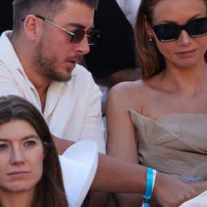 Amandine Petit et Julien Georges dans les tribunes lors des Internationaux de France de Tennis de Roland Garros 2023. Paris, le 29 mai 2023. © Jacovides / Moreau / Bestimage 