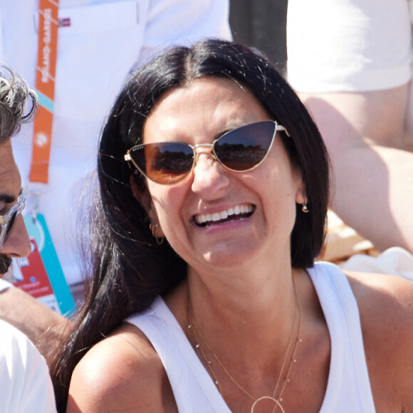 John Mamann et une amie dans les tribunes lors des Internationaux de France de Tennis de Roland Garros 2023. Paris, le 29 mai 2023. © Jacovides / Moreau / Bestimage 
