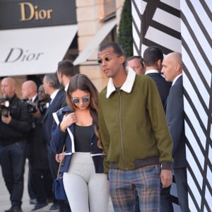 Le chanteur Stromae, se laisse pousser les cheveux, et sa femme Coralie Barbier - People sortant du défilé de mode "Louis Vuitton", collection prêt-à-porter Printemps-Eté 2017 à Paris, le 5 octobre 2016. © CVS/Veeren/Bestimage 