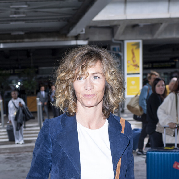 Cécile de France - Les célébrités arrivent à l'aéroport Nice Côte d'Azur lors du 76ème Festival International du Film de Cannes, à Nice, France, le 20 mai 2023. © Da Silva-Perusseau/Bestimage 