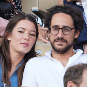 Plus que quelques jours avant la fin de la compétition.
Thomas Hollande avec sa femme Emilie - Tribunes lors des Internationaux de France de tennis de Roland Garros, à Paris. © Jacovides-Moreau/Bestimage