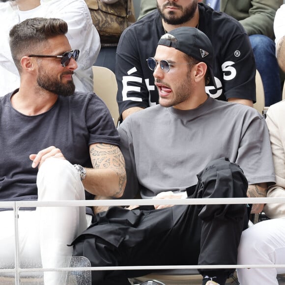 Olivier Giroud, Théo Hernandez, Benjamin Pavard - Célébrités en tribunes des Internationaux de France de tennis de Roland Garros 2023 à Paris le 11 juin 2023. © Jacovides-Moreau/Bestimage 