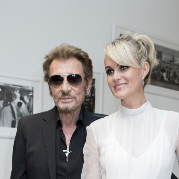 Johnny Hallyday et sa femme Laeticia Hallyday - People au défilé de mode Haute-Couture automne-hiver 2016/2017 "Christian Dior" à Paris. Le 4 juillet 2016 © Olivier Borde / Bestimage 