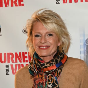 Sophie Davant - Photocall à la première du film "Tourner pour vivre" sur la vie cinématographique du réalisateur C.Lelouch à Paris le 25 avril 2022. © Coadic Guirec / Bestimage 