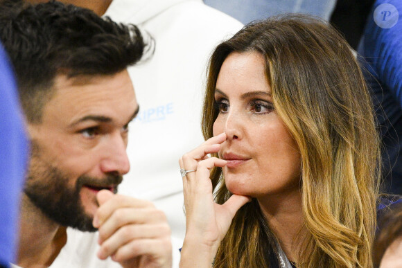 Hugo Lloris et sa femme Marine - People et joueurs en famille dans les tribunes lors du match de demi-finale "France - Maroc" lors de la Coupe du Monde 2022 au Qatar (FIFA World Cup Qatar 2022). © JB Autissier / Panoramic / Bestimage