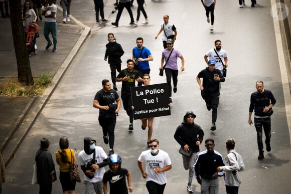 Hicham Hammouti a accordé une interview au Parisien mercredi 5 juillet 2023
Marche blanche organisée en hommage à Nahel jeune homme tué par un policier après un refus d'obtempérer, à Nanterre, France, le 29 juin 2023. 6.200 personnes sont présentes, selon la police. © Jean-Baptiste Autissier/Panoramic/bestimage 