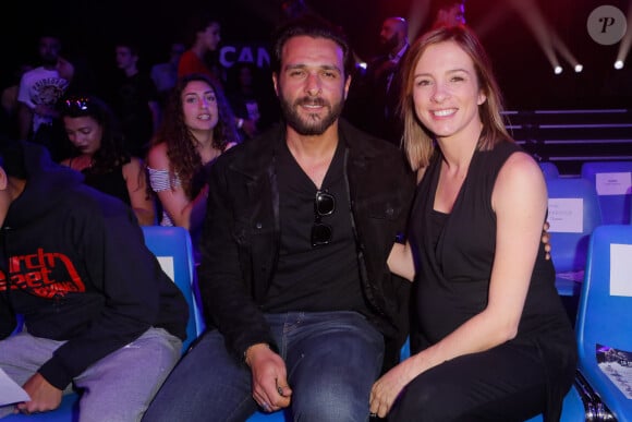 Maxim Nucci (Yodelice) et sa compagne enceinte Isabelle Ithurburu assistent au match de boxe de Tony Yoka au palais des sports de Paris, le 23 juin 2018 © Veeren-CVS/Bestimage