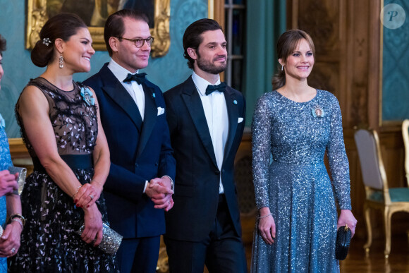 La princesse Victoria de Suède, Le prince Daniel de Suède, La princesse Sofia (Hellqvist) de Suède, Le prince Carl Philip de Suède, lors du dîner de gala annuel "Sverigemiddagen (dîner suédois)", suivi d'un concert dans la salle Rikssalen du palais royal à Stockholm, le 20 janvier 2023.