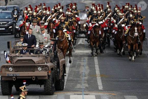 Il a montré toutes les forces qui protègent la France
Le président français Emmanuel Macron lors de la cérémonie du 143ème défilé militaire du 14 juillet, jour de la Fête Nationale, sur les Champs-Elysées et la place de la Concorde, à Paris, France, le 14 juillet 2023. © Stéphane Lemouton/Bestimage