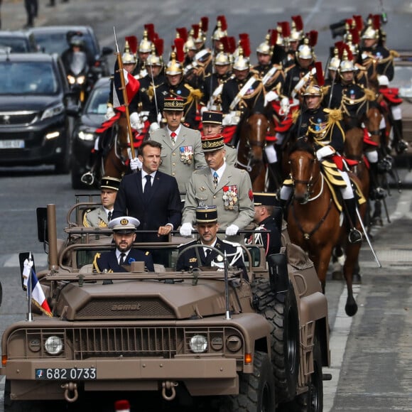 Il a montré toutes les forces qui protègent la France
Le président français Emmanuel Macron lors de la cérémonie du 143ème défilé militaire du 14 juillet, jour de la Fête Nationale, sur les Champs-Elysées et la place de la Concorde, à Paris, France, le 14 juillet 2023. © Stéphane Lemouton/Bestimage