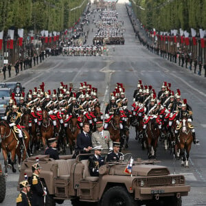 Le président français Emmanuel Macron lors de la cérémonie du 143ème défilé militaire du 14 juillet, jour de la Fête Nationale, sur les Champs-Elysées et la place de la Concorde, à Paris, France, le 14 juillet 2023. © Stéphane Lemouton/Bestimage