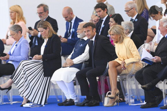 Narendra Modi - Premier Ministre Indien / Inde Emmanuel Macron, président de la République française Brigitte Macron lors de la cérémonie du 143ème défilé militaire du 14 juillet, jour de la Fête Nationale, sur les Champs-Elysées et la place de la Concorde, à Paris, France, le 14 juillet 2023. © Jean-Baptiste Autissier/Panoramic/Bestimage  Bastille Day parade on July 14, 2023, in Paris, France. France prepares to celebrate the national holiday known as Bastille Day on July 14, with heightened security and a fireworks sale ban following recent violent anti-government protests. 