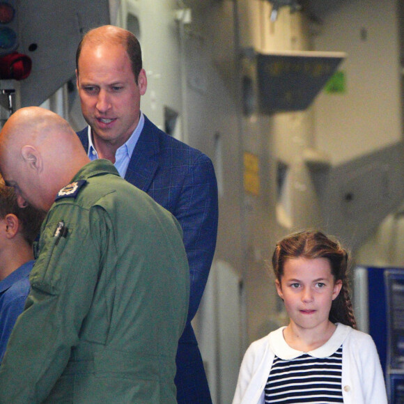 Le prince William, prince de Galles, et Catherine (Kate) Middleton, princesse de Galles, avec leurs enfants le prince George de Galles, et la princesse Charlotte de Galles, lors d'une visite au Royal International Air Tattoo (RIAT) à RAF Fairford, le 14 juillet 2023. 