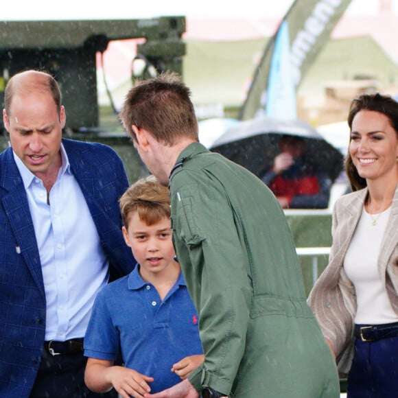 Le prince William, prince de Galles, et Catherine (Kate) Middleton, princesse de Galles, avec leurs enfants le prince George de Galles, et la princesse Charlotte de Galles, lors d'une visite au Royal International Air Tattoo (RIAT) à RAF Fairford, le 14 juillet 2023. 