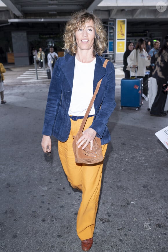 Cécile de France - Les célébrités arrivent à l'aéroport Nice Côte d'Azur lors du 76ème Festival International du Film de Cannes, à Nice, France, le 20 mai 2023. © Da Silva-Perusseau/Bestimage 