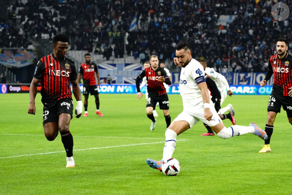 Dimitri Payet (Olympique de Marseille) - Youssuf Ndayishimiye (OGC Nice) lors du match de Ligue 1 Uber Eats "Marseille - Nice (1-3)" au stade Vélodrome, le 5 février 2023. 