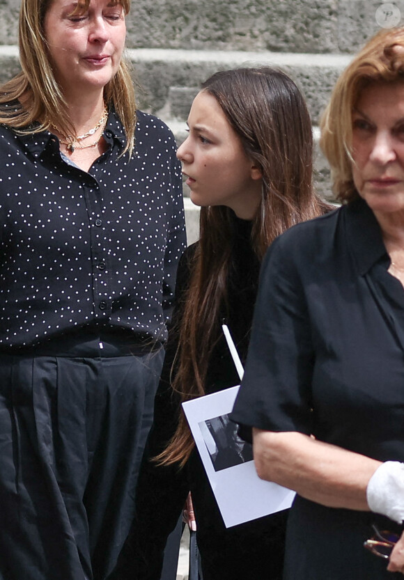 Jo Attal, ( with a Union Jack on her bag) daughter of Charlotte Gainsbourg and Yvan Attal during the funeral at Saint Roch Church in Paris, France on July 24, 2023, of British-born singer and actor Jane Birkin, who died on July 16, 2023 in Paris aged 76. Photo by Nasser Berzane/ABACAPRESS.COM 