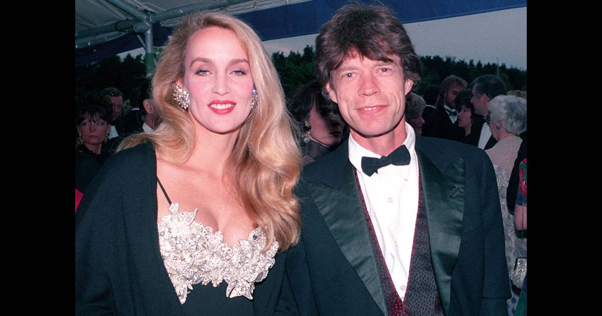 Jerry Hall et Mick Jagger en 1991 - Purepeople