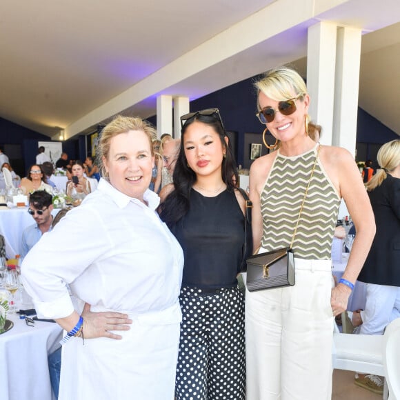 Exclusif - La cheffe Hélène Darroze, Laeticia Hallyday et sa fille Joy dans l'Espace VIP lors de la 9ème édition du "Longines Paris Eiffel Jumping" au Champ de Mars à Paris, France, le 25 juin 2023. © Perusseau-Veeren/Bestimage 