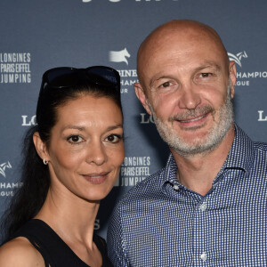 Frank Leboeuf renouvelle ses voeux avec Chrislaure.
Exclusif - Frank Leboeuf et sa femme Chrislaure Nollet - Photocall du Longines Paris Eiffel Jumping au Champ de Mars à Paris. © Veeren/Borde/Bestimage