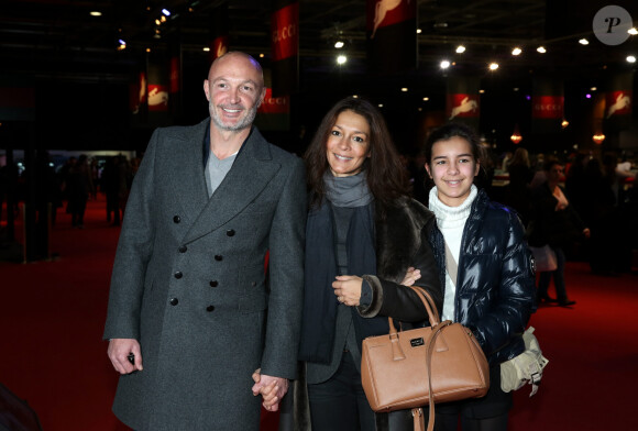 Frank Leboeuf avec sa compagne Chrislaure Nollet (ex-femme de Fabrice Santoro) et la fille de celle-ci Djenae - Gucci Paris Masters 2013 a Villepinte le 8 decembre 2013.